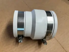 1056-215 Fernco Coupling 1 1/2 Inch To 2 C.i.to Plastic Whie