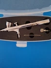 Sparmax Gravity Feed MAX35 Airbrush New In Case Used. Price: $53.95.