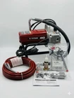 Titan Impact 410 Airless Paint Sprayer W/ Gun, Hose, Manual, Fluid New. Price: $1050.00.