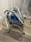 Graco Blue Electric Airless Paint Sprayer With Hose, Stand Frame Used. Price: $600.00.